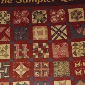 Elegant Patchwork Quilt in Red and Cream